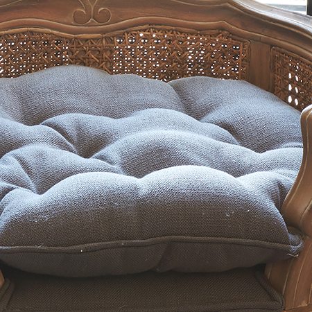 Removable cushion pleat & button